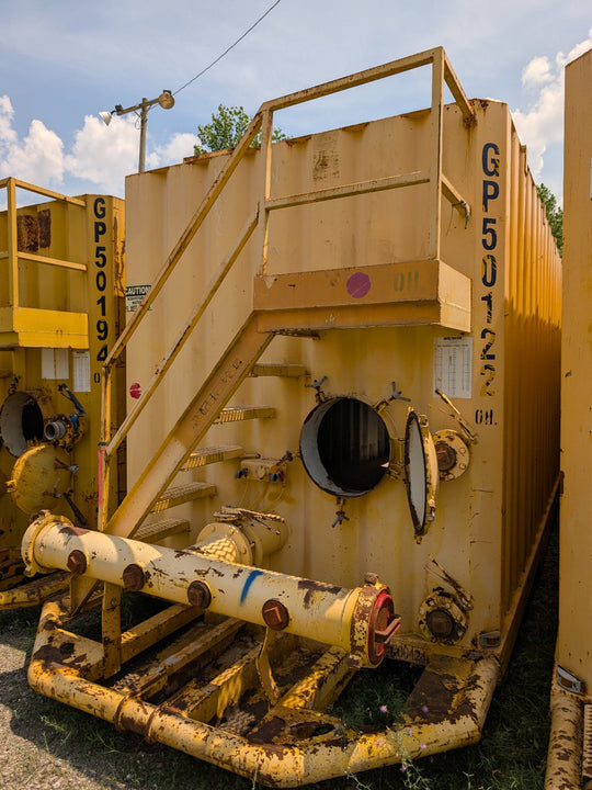 Front of yellow Wichita flat top frac tank #GP50122