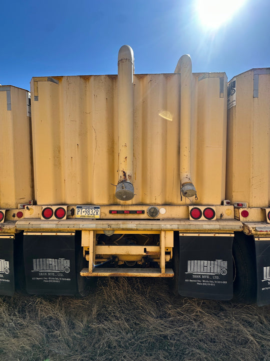 Rear view of the yellow Wichita 21,000 gallon frac tank #GP50042